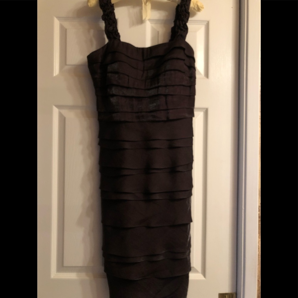 Beautiful chocolate colored ruffled dress from Sangria.